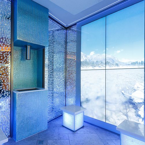 Modernes Spa-Interieur mit blauen Mosaikwänden und großen Fenstern mit winterlichem Bergpanorama.